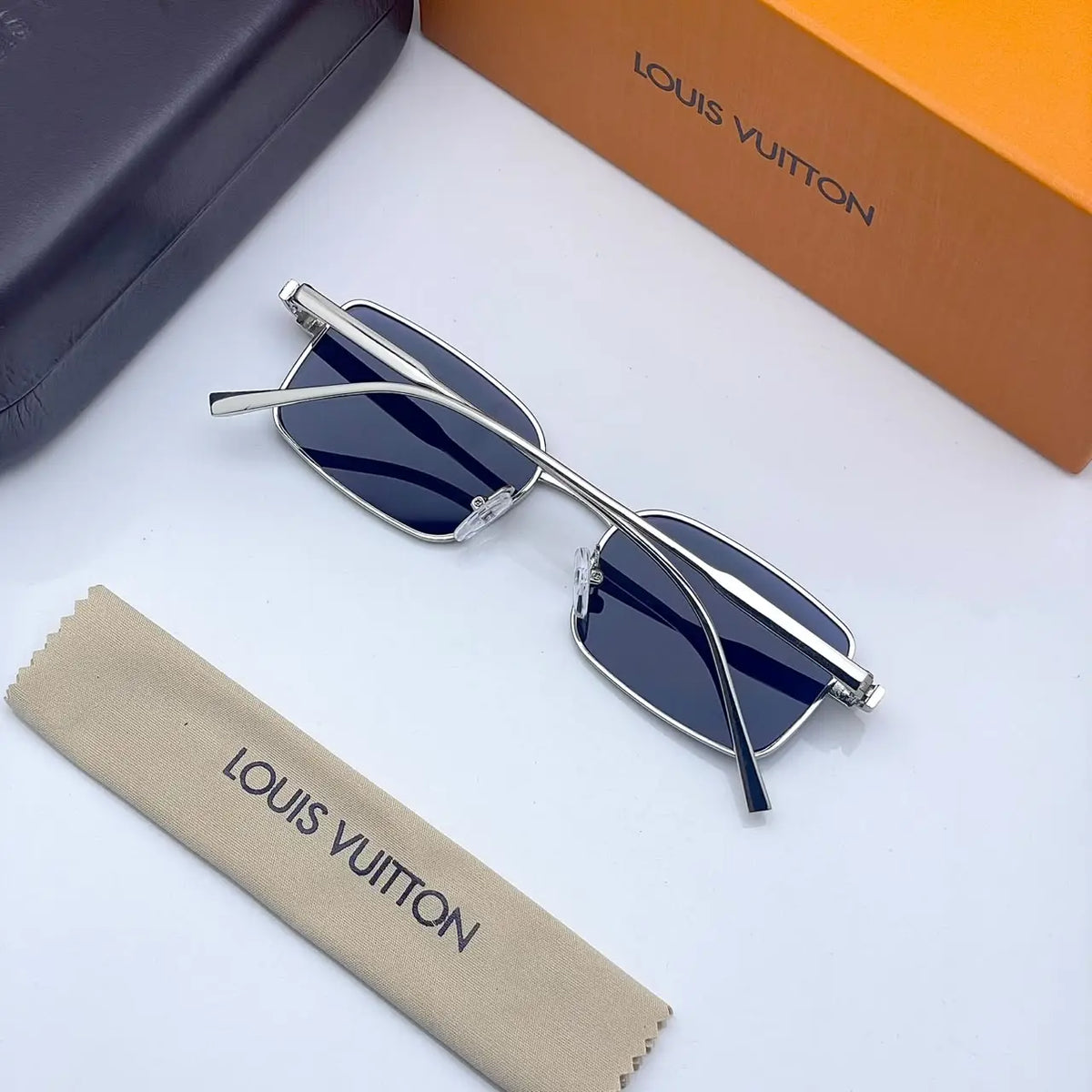 Louis Vuitton 3214 silver blue
